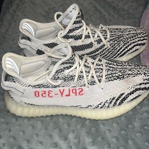 Black and white striped Yeezys. Size 8.5 in men’s, size 10 in women’s.